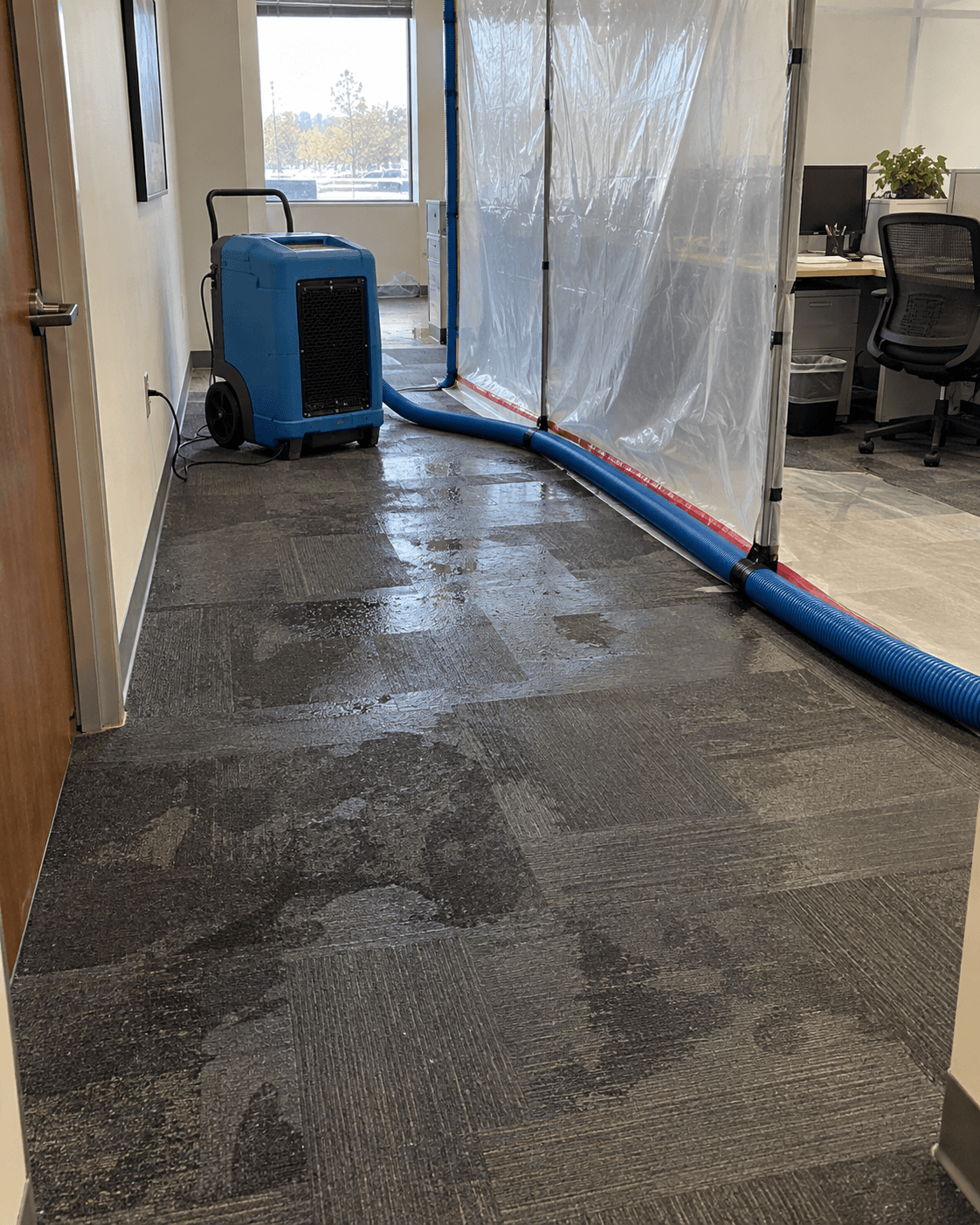 Drying equipment in a contained office work zone